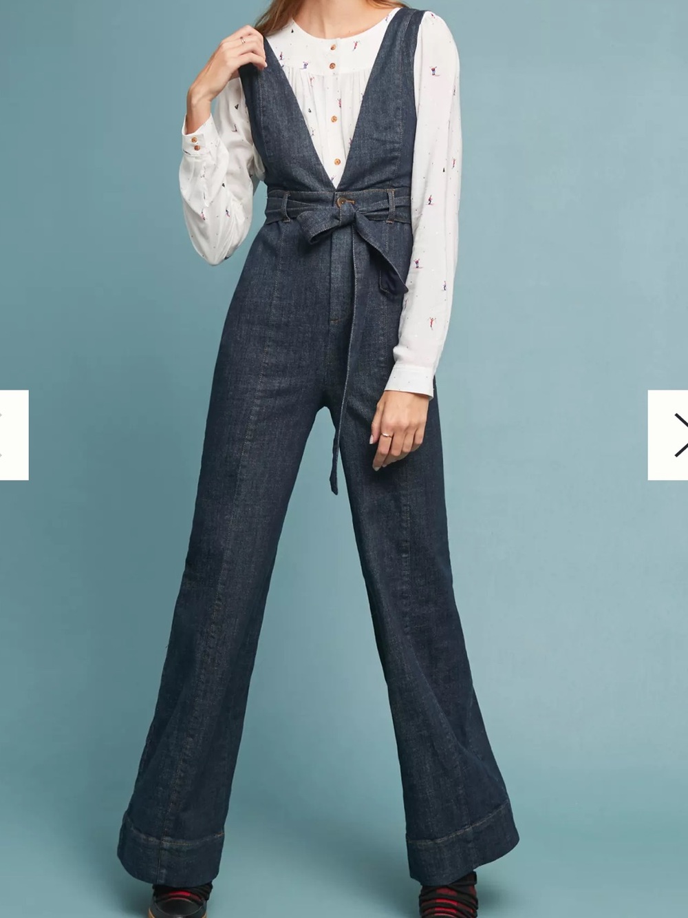 Anthropologie blue denim jumpsuit with tie waist, size 2